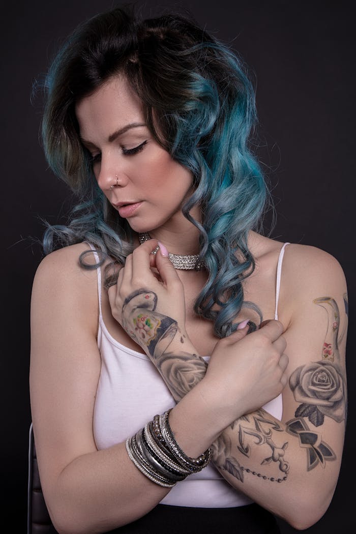 Woman with Tattoo on Left Arm